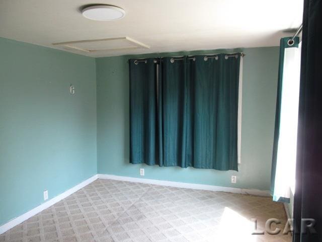 10320 Springville Hwy, Onsted, MI 49265 - unfurnished room with baseboards