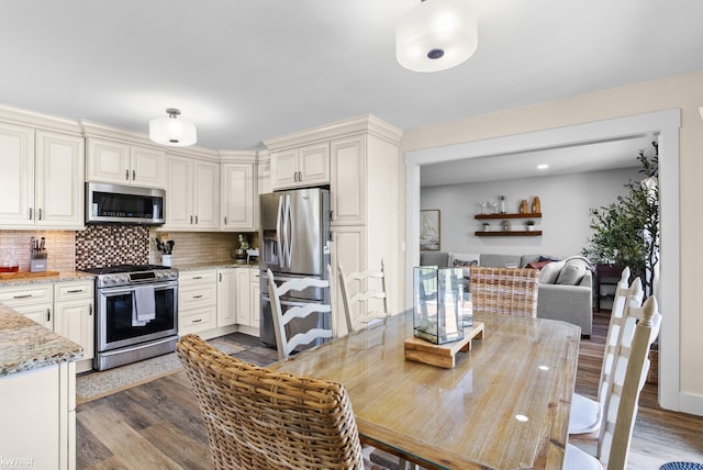 14043 Landings Way, Fenton, MI 48430 - dining area with dark wood finished floors