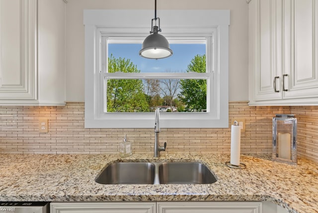 14043 Landings Way, Fenton, MI 48430 - kitchen with a sink, backsplash, white cabinetry, and dishwasher