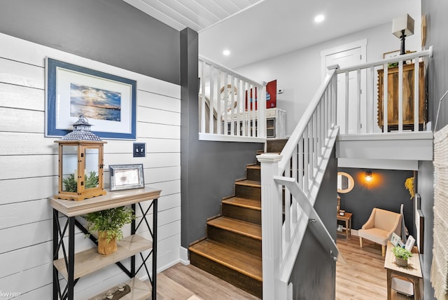 14043 Landings Way, Fenton, MI 48430 - stairway featuring wood finished floors, recessed lighting, and baseboards