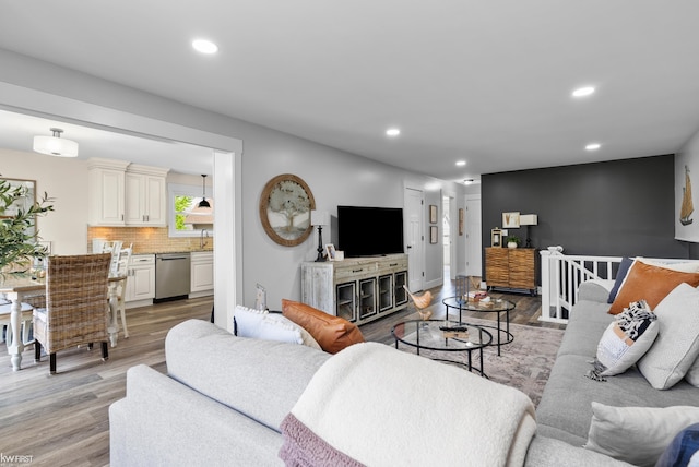 14043 Landings Way, Fenton, MI 48430 - living area featuring light wood-style flooring and recessed lighting