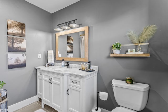 14043 Landings Way, Fenton, MI 48430 - full bathroom featuring baseboards, toilet, vanity, and tile patterned floors
