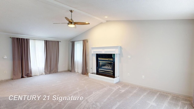 5489 Winchester Way, Gladwin, MI 48624 - unfurnished living room featuring ceiling fan, a tiled fireplace, vaulted ceiling, carpet, and baseboards