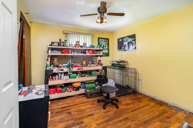 office featuring a ceiling fan and wood finished floors