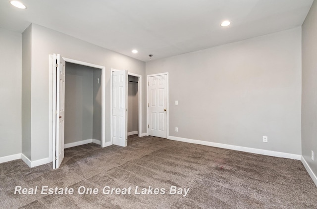 1006 Cass Ave, Bay City, MI 48708 - unfurnished bedroom featuring carpet floors, recessed lighting, and baseboards