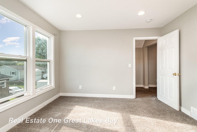 1006 Cass Ave, Bay City, MI 48708 - carpeted spare room with recessed lighting and baseboards