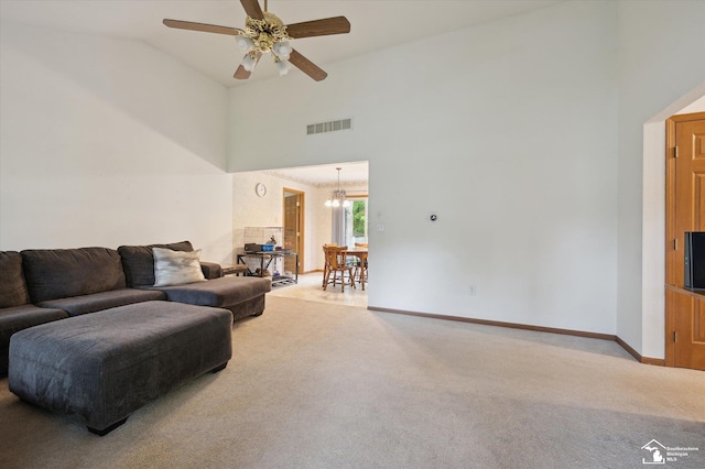 2285 Reddington Dr, Temperance, MI 48182 - living room featuring carpet flooring, a ceiling fan, a chandelier, baseboards, and high vaulted ceiling