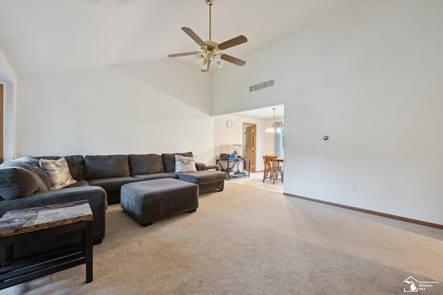 2285 Reddington Dr, Temperance, MI 48182 - carpeted living area with a ceiling fan, a chandelier, high vaulted ceiling, and baseboards