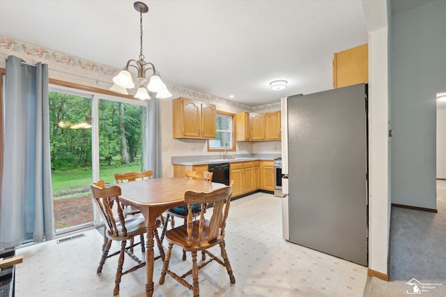 2285 Reddington Dr, Temperance, MI 48182 - dining space with a chandelier, plenty of natural light, and baseboards