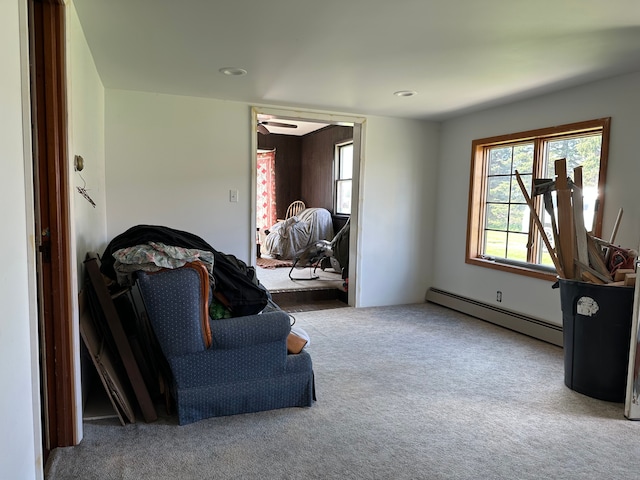 9548 Sharp Rd, Clifford, MI 48727 - sitting room featuring a baseboard heating unit and carpet floors