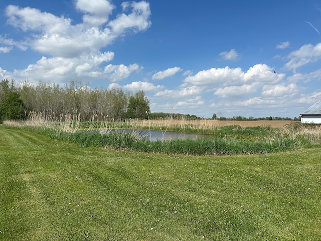 9548 Sharp Rd, Clifford, MI 48727 - view of green lawn with a rural view