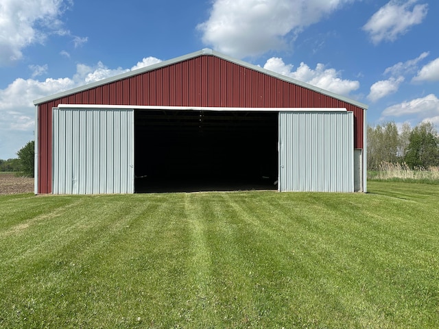 9548 Sharp Rd, Clifford, MI 48727 - view of pole building with a lawn