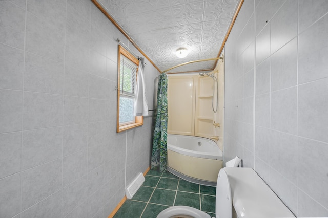 237 Main St, Walkerville, MI 49459 - bathroom featuring tile walls, shower / bath combo, and tile patterned floors