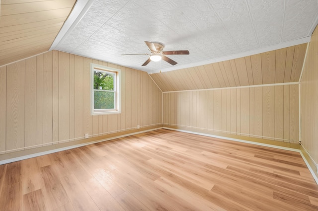 237 Main St, Walkerville, MI 49459 - bonus room with wood finished floors, ceiling fan, vaulted ceiling, and wooden walls