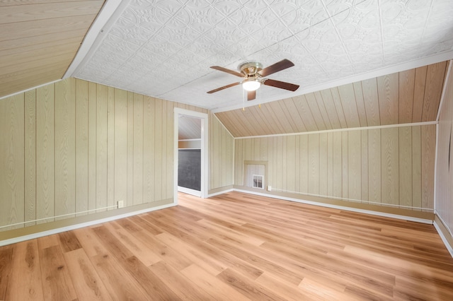 237 Main St, Walkerville, MI 49459 - bonus room with ceiling fan, wood finished floors, lofted ceiling, baseboards, and wooden walls