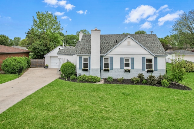 22019 Violet St, Saint Clair Shores, MI 48082 - view of front of property with a chimney, driveway, and a shingled roof