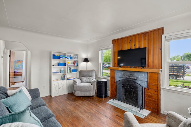 22019 Violet St, Saint Clair Shores, MI 48082 - living room with dark wood-style flooring and a fireplace