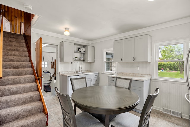22019 Violet St, Saint Clair Shores, MI 48082 - dining room featuring plenty of natural light and stairway