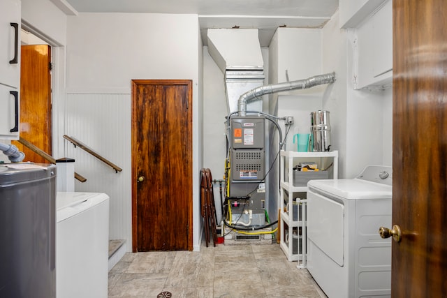 22019 Violet St, Saint Clair Shores, MI 48082 - laundry area with washing machine and dryer and a wainscoted wall