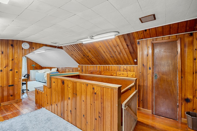 22019 Violet St, Saint Clair Shores, MI 48082 - bonus room with wooden walls, hardwood / wood-style floors, and lofted ceiling
