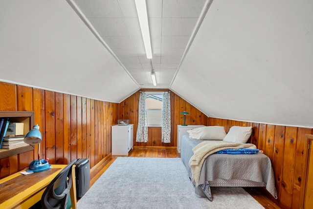22019 Violet St, Saint Clair Shores, MI 48082 - bedroom with wood finished floors, washer / clothes dryer, lofted ceiling, wooden walls, and an office area