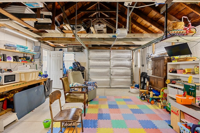 22019 Violet St, Saint Clair Shores, MI 48082 - garage with a garage door opener and wooden ceiling