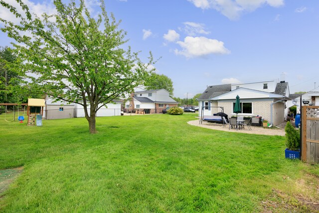 22019 Violet St, Saint Clair Shores, MI 48082 - view of yard with a patio and a playground