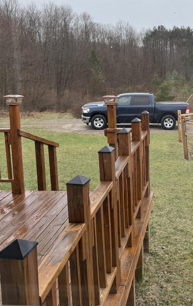 3135 Montgomery Rd, Bellaire, MI 49615 - wooden terrace with a yard