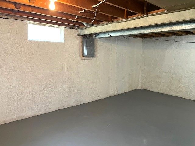 basement with electric panel