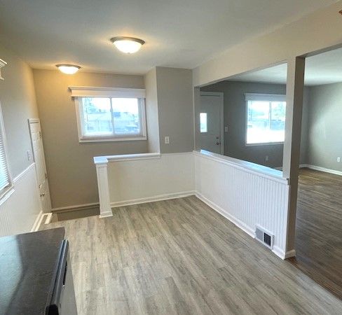 empty room featuring wood finished floors