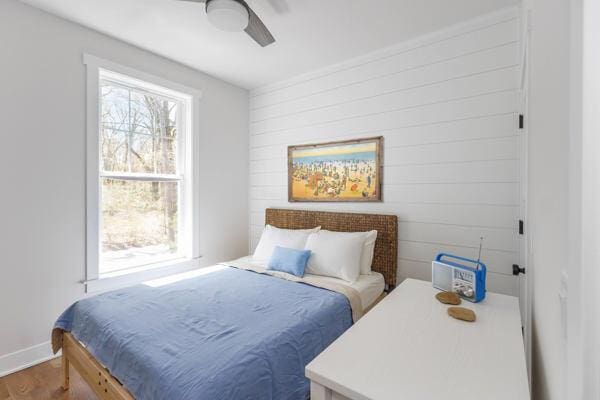 4108 Chippewa Trl, New Buffalo, MI 49117 - bedroom featuring wood finished floors, baseboards, and ceiling fan