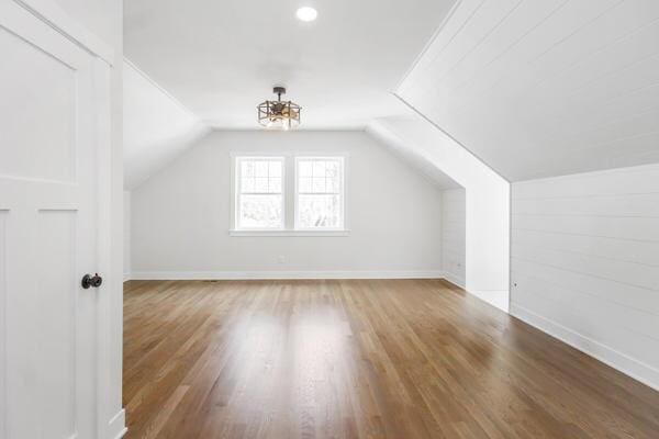 4108 Chippewa Trl, New Buffalo, MI 49117 - bonus room featuring vaulted ceiling, baseboards, and wood finished floors