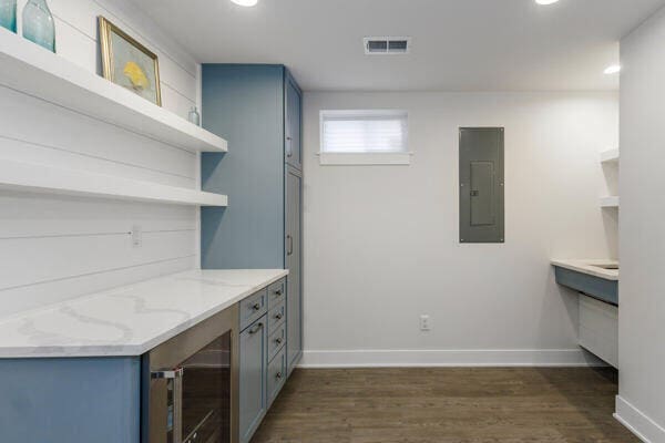 4108 Chippewa Trl, New Buffalo, MI 49117 - bar area featuring electric panel, wine cooler, dark wood finished floors, baseboards, and recessed lighting