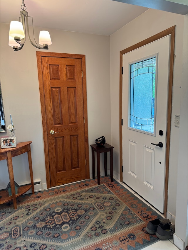 2071 N Belsay Rd, Burton, MI 48509 - entryway featuring baseboards and a chandelier