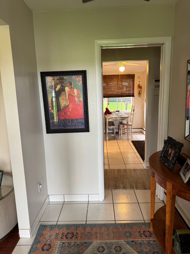 2071 N Belsay Rd, Burton, MI 48509 - corridor with tile patterned floors and baseboards