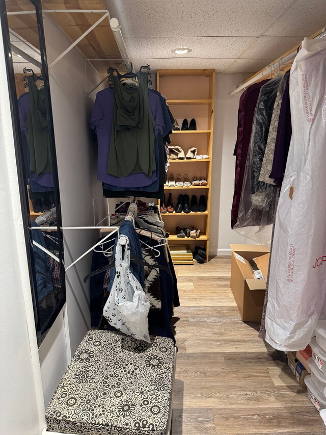 2071 N Belsay Rd, Burton, MI 48509 - spacious closet featuring wood finished floors