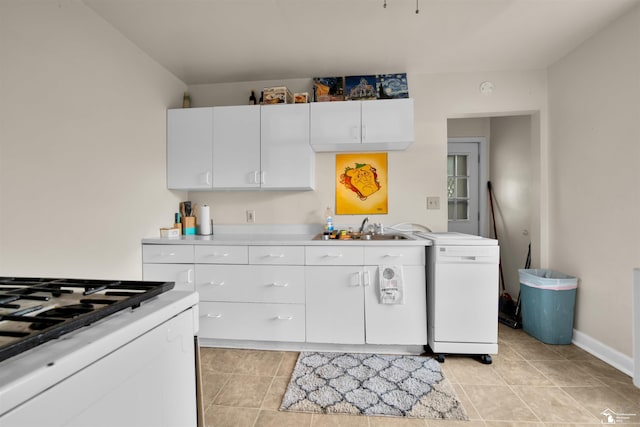 2651 5th St, Trenton, MI 48183 - kitchen featuring a sink, white appliances, light countertops, white cabinetry, and baseboards