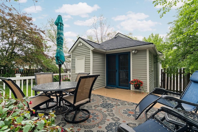 3334 Platt Rd, Ann Arbor, MI 48108 - view of patio featuring a deck, fence, and outdoor dining area