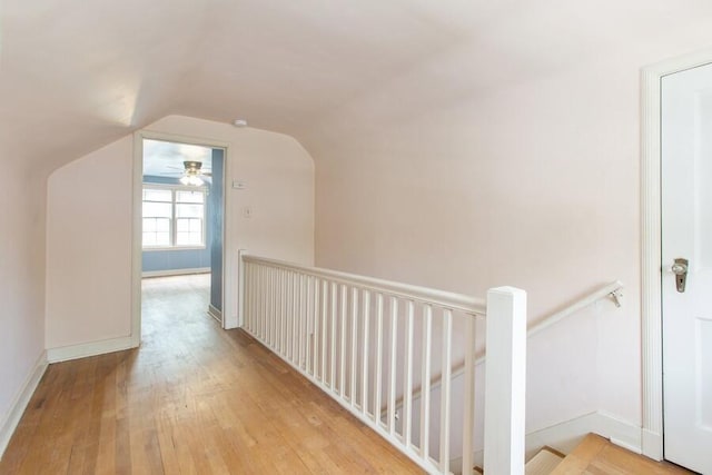 2520 S State St, Saint Joseph, MI 49085 - corridor with lofted ceiling, hardwood / wood-style floors, an upstairs landing, and baseboards