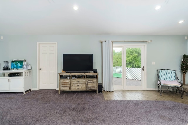 living room with baseboards and recessed lighting