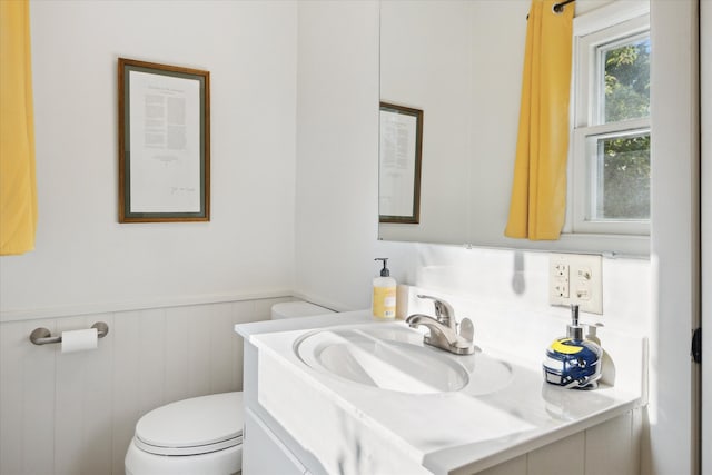 314 W Madison St, Ann Arbor, MI 48103 - bathroom with toilet, wainscoting, and vanity