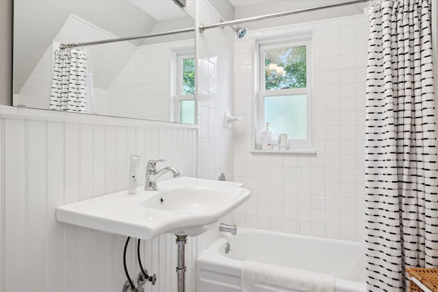 314 W Madison St, Ann Arbor, MI 48103 - bathroom featuring shower / tub combo with curtain and lofted ceiling