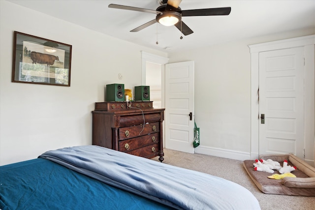 314 W Madison St, Ann Arbor, MI 48103 - bedroom with carpet, baseboards, and a ceiling fan
