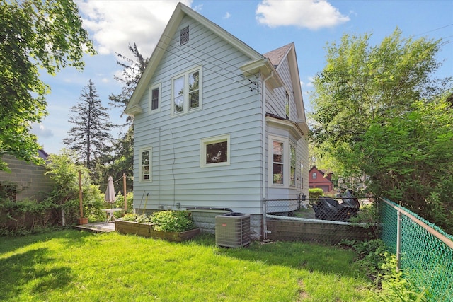 314 W Madison St, Ann Arbor, MI 48103 - rear view of property with central AC unit