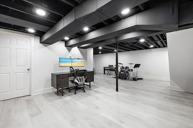 office with wood finished floors and baseboards