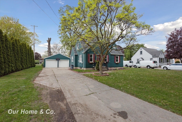 700 Scheurmann St, Essexville, MI 48732 - view of front facade featuring a garage, an outdoor structure, and a front yard