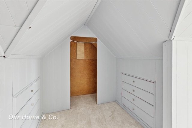 700 Scheurmann St, Essexville, MI 48732 - bonus room featuring vaulted ceiling, light colored carpet, and wood walls