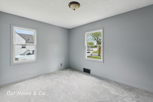 700 Scheurmann St, Essexville, MI 48732 - empty room with carpet flooring and baseboards