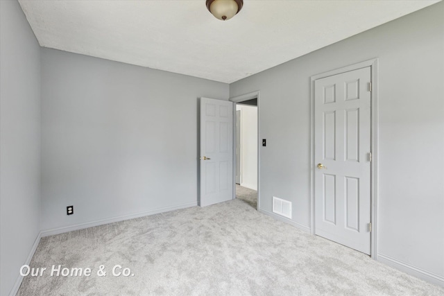 700 Scheurmann St, Essexville, MI 48732 - unfurnished bedroom with carpet and baseboards
