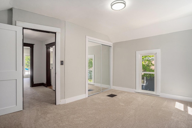 24 W Bernard St, Hartford, MI 49057 - spare room featuring carpet flooring, plenty of natural light, and baseboards
